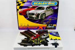 Scalextric - A boxed Scalextric Road Rivals set # C1150.