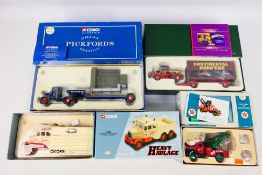 Corgi - 4 x boxed trucks in 1:50 scale including a Mack B Series wrecker in Texaco livery # US52308,