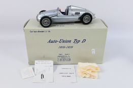 CMC - A 1938 boxed Auto Union Type D Grand Prix car # M-027.