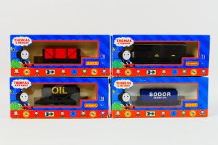 Hornby - Thomas and Friends - 4 x boxed Hornby OO gauge wagons, tankers,