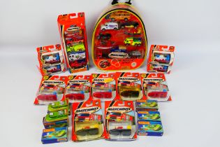 Matchbox - A collection of boxed and carded models including a To The Rescue 10 - pack from 2001,