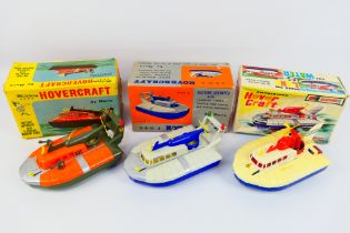 Marx - Clifford - 3 x boxed battery operated Hovercraft models,