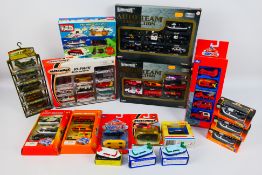 Matchbox - Edocar - Tomy - Fast Lane - A collection of boxed / carded vehicles including military