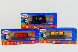 Hornby - 3 x boxed Hornby OO gauge wagons and tanker wagons - Lot includes a #R9234 7 Plank Open