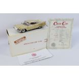 Danbury Mint - A boxed 1:24 scale die-cast 1958 Plymouth Fury by Danbury Mint - Model comes in