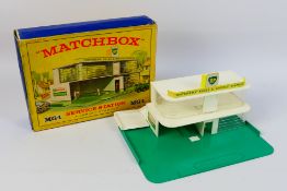 Matchbox - A boxed Matchbox #MG-1 BP Service Station - Box appears in fair condition with signs of
