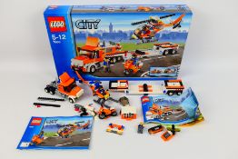Lego - A boxed Lego City Set City #7686 Helicopter Transporter set with instruction manuals.