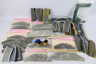 Hornby - Model Scene - Unsold Shop Stock - A group of bagged hand made granite retaining walls in