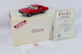 Danbury Mint - A boxed 1:24 scale die-cast 1968 Chevrolet Chevelle SS-396 by Danbury Mint - Model