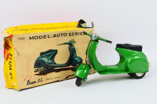 Bandai - A boxed tinplate Vespa GS scooter in rare green finish in Near Mint condition # 750.