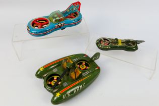 Ichimura - Daiya - Asahi Toy Co - A group of vintage tinplate hovercraft models, 2 x in U.S.