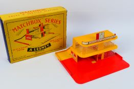 Matchbox - A boxed Matchbox Sales and Service Station - Box appears in fair condition with signs