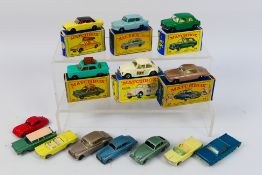 Matchbox - 14 x boxed/unboxed Matchbox die-cast model vehicles - Lot includes a #7 Ford Anglia.