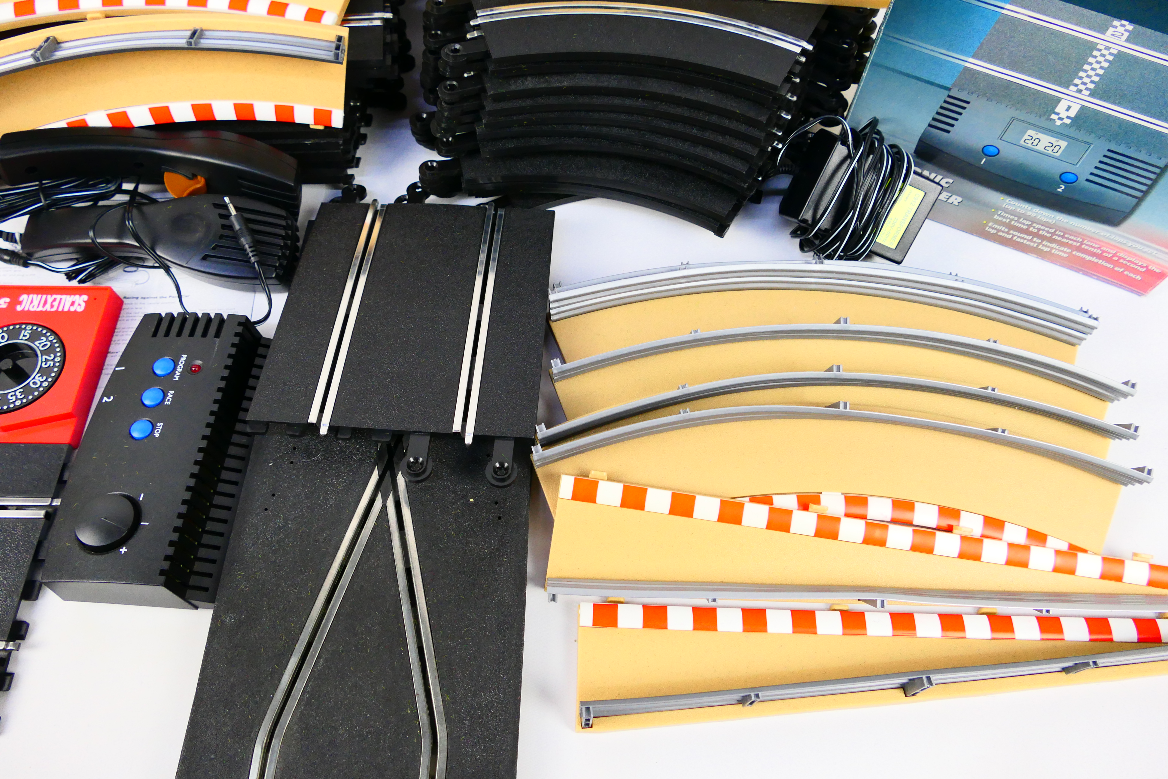 Scalextric - A quantity of slot car track sections, track side barriers, a boxed lap counter timer, - Image 5 of 5