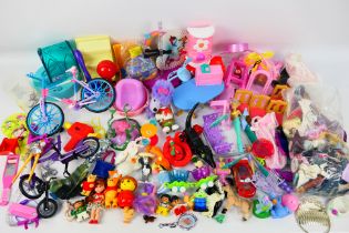 Barbie - Others - A large miscellany of doll accessories from a variety of franchises including,