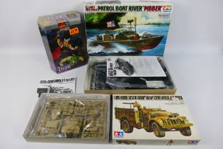 Tamiya - Toy Biz - Three boxed plastic model kits in various scales.