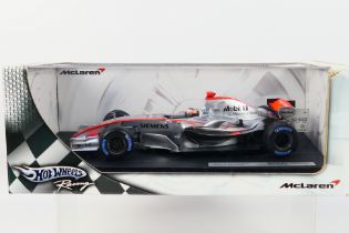 Hot Wheels - A boxed 1:18 scale Hot Wheels 'Racing' J2984 McLaren MP4-21 F1 diecast racing car,