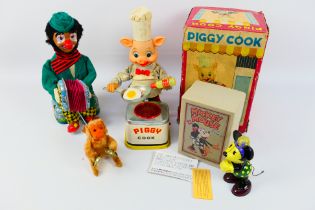 Cragston - Yonezawa - Other - A collection of tinplate toys to include an unboxed battery Cragston