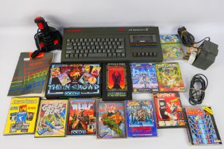 Sinclair - An unboxed Sinclair ZX Spectrum + 2 with joy stick, power lead,