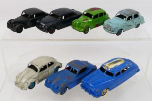 Dinky - A group of unboxed model cars including Volkswagen Beetle # 181, Austin Somerset # 161,