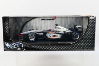 Hot Wheels - A boxed 1:18 scale Hot Wheels 'Racing' JB1650 McLaren MP4-17D F1 diecast racing car,