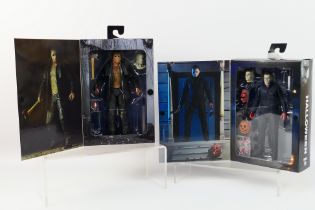 NECA - Two boxed 7" action figures from NECA.