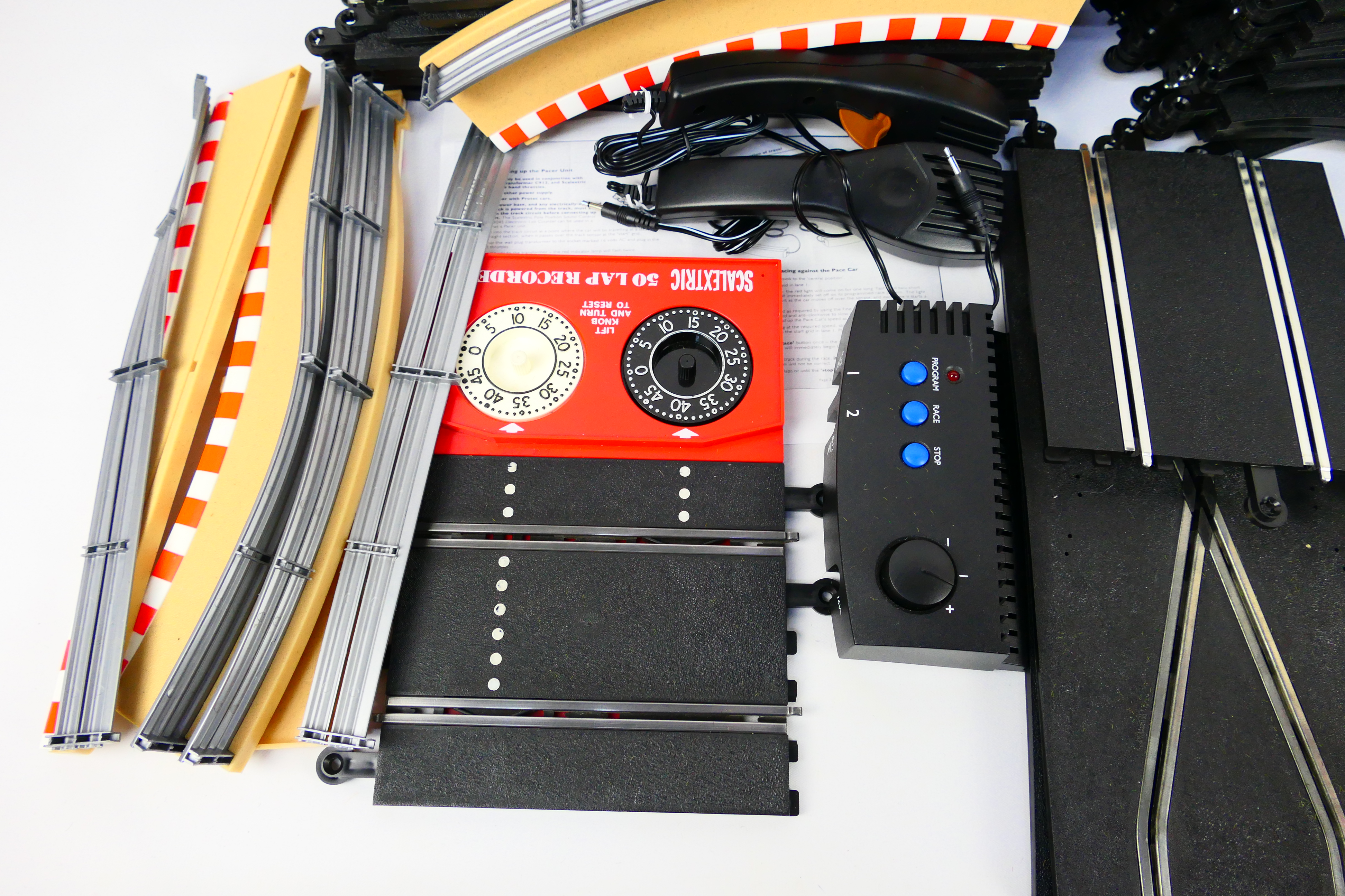 Scalextric - A quantity of slot car track sections, track side barriers, a boxed lap counter timer, - Image 3 of 5