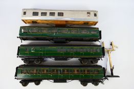 Exley - Chad Valley - 4 x O gauge coaches, three in Southern Railway livery, one is unfinished.