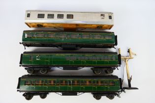 Exley - Chad Valley - 4 x O gauge coaches, three in Southern Railway livery, one is unfinished.