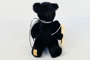Deans Rag Book Company - A limited edition jointed mohair bear named Larry.