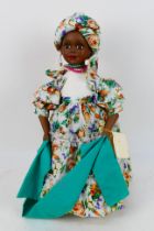 Alberon - An unboxed Alberon porcelain doll named Carmen with stand.