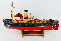 A radio controlled tug / harbour vessel