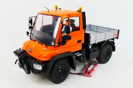 Carson - An unboxed 1:12 scale Carson RC Unimog U300.