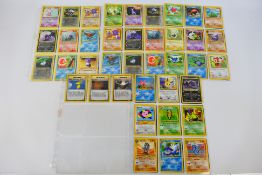 Pokemon - A complete set of 75 x Neo Discovery cards all housed in album pages so appear Near Mint.