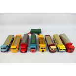 Corgi - An assortment of eight unboxed Diecast Corgi Flatbed wagon and vans comprising of a Blue