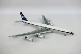Skyline - A boxed 1:200 scale Boeing 707-436 model in BOAC livery.