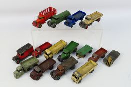 Dinky - A fleet of unboxed trucks including early lorry # 22c, Austin lorry # 30s,