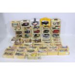 Lledo - A boxed collection of 55 diecast model vehicles from Lledo.