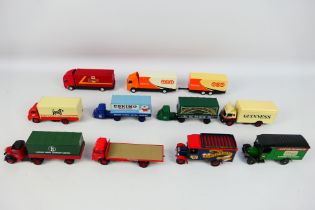 Corgi - An assortment of ten unboxed Diecast Corgi Flatbed wagon and vans comprising of a Corgi