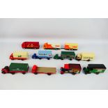 Corgi - An assortment of ten unboxed Diecast Corgi Flatbed wagon and vans comprising of a Corgi