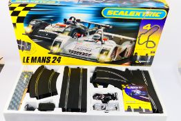 Scalextric - A large boxed Scalextric Le Mans 24 set # C1083.