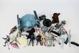 Hasbro - Other - An unboxed group of Star Wars action figures and collectable models.