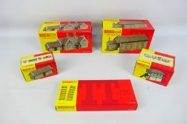 Hornby - A collection of four Horny TT Guage resin buildings comprising of a Signal Box(TT9004),