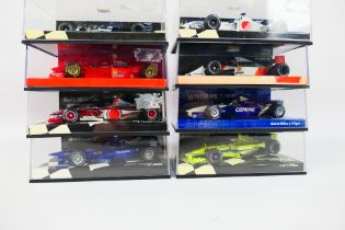 Minichamps - Eight boxed 1:43 scale diecast F1 racing cars from Minichamps.