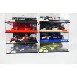 Minichamps - Eight boxed 1:43 scale diecast F1 racing cars from Minichamps.