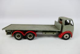 Shackleton - An unboxed Foden FG flat bed lorry by Shackleton in grey and red,