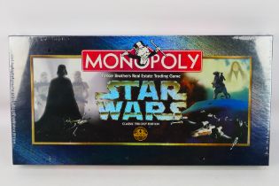 Monopoly - Parker - A boxed, factory sealed 'Star Wars Classic Trilogy Edition' Monopoly board game.