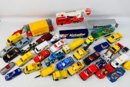 Corgi Toys - Matchbox - A group of unboxed diecast model vehicles in various scales.