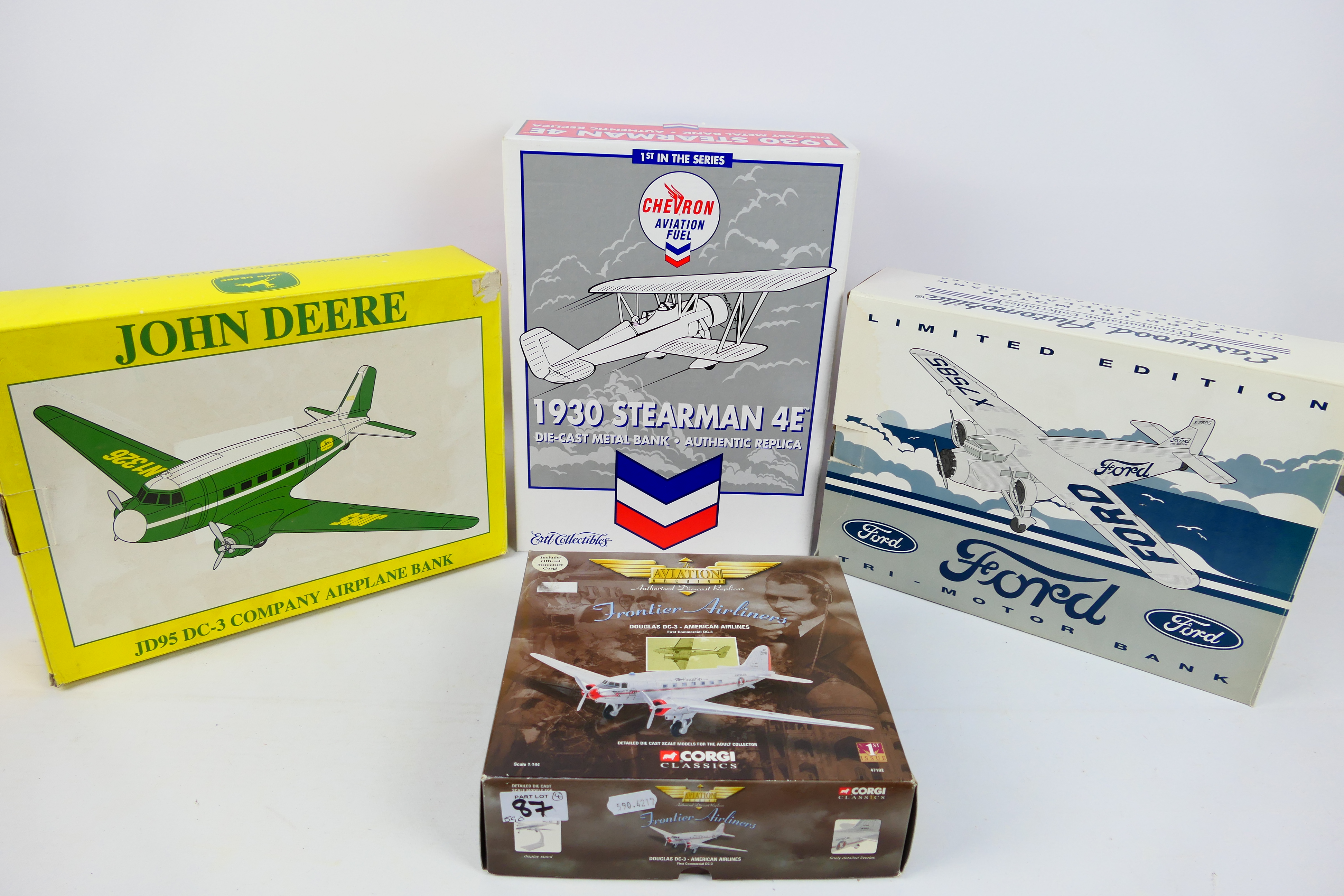 Corgi Aviation Archive - Ertl Collectibles - A boxed diecast model aircraft and three diecast model