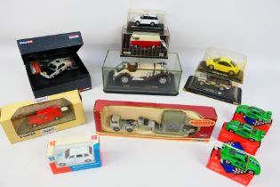 Corgi - Schuco - Burago - An assortment of 12 boxed cars from a number of different brands (8 Corgi,